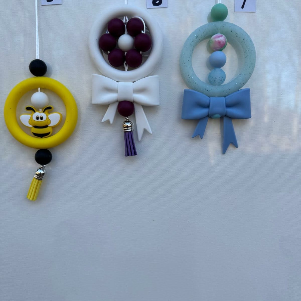 Playful Silicone Ring Charm Trio - Yellow Bee, White Bow, Blue Bow